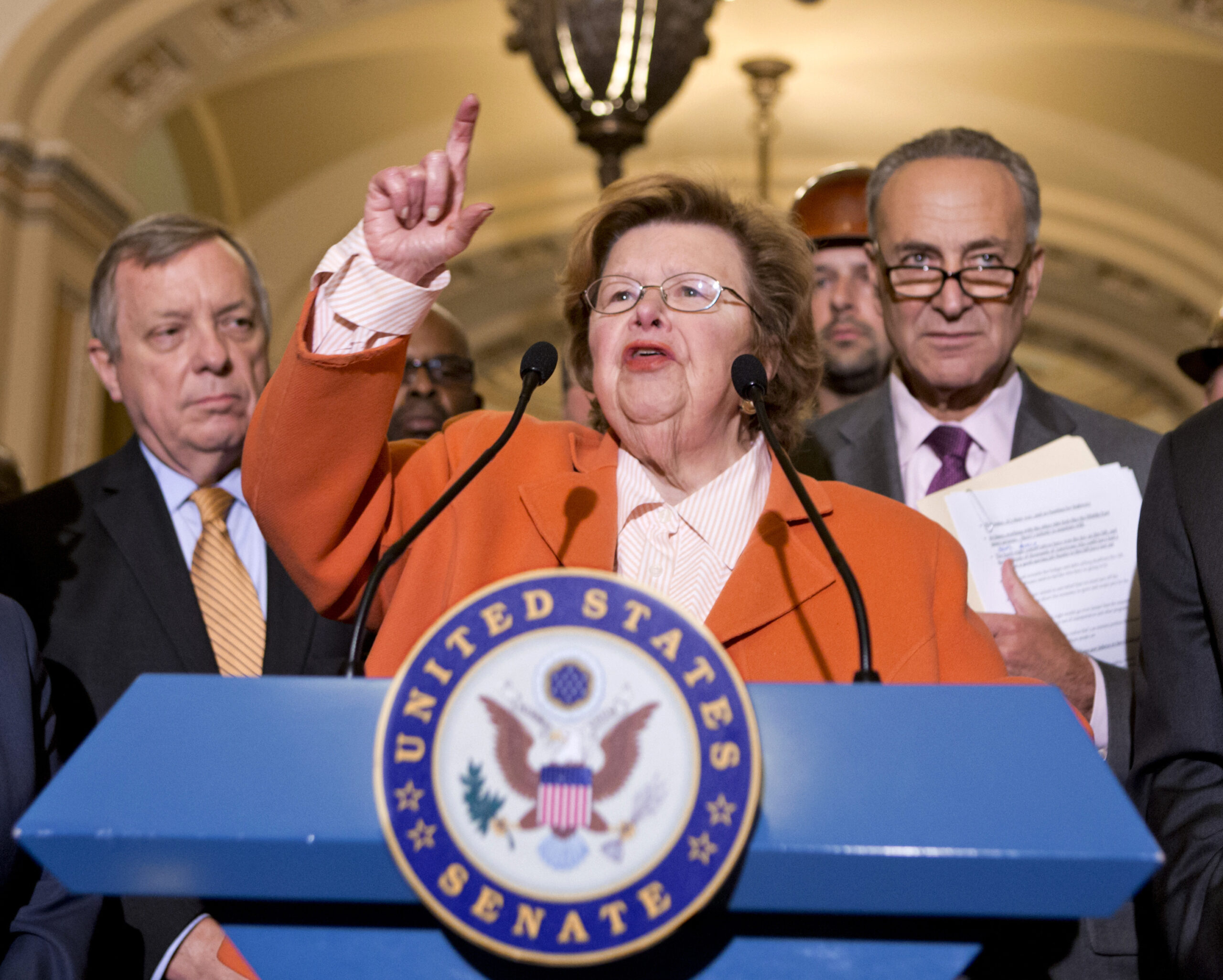 Automatic spending cuts would bite more in 2014