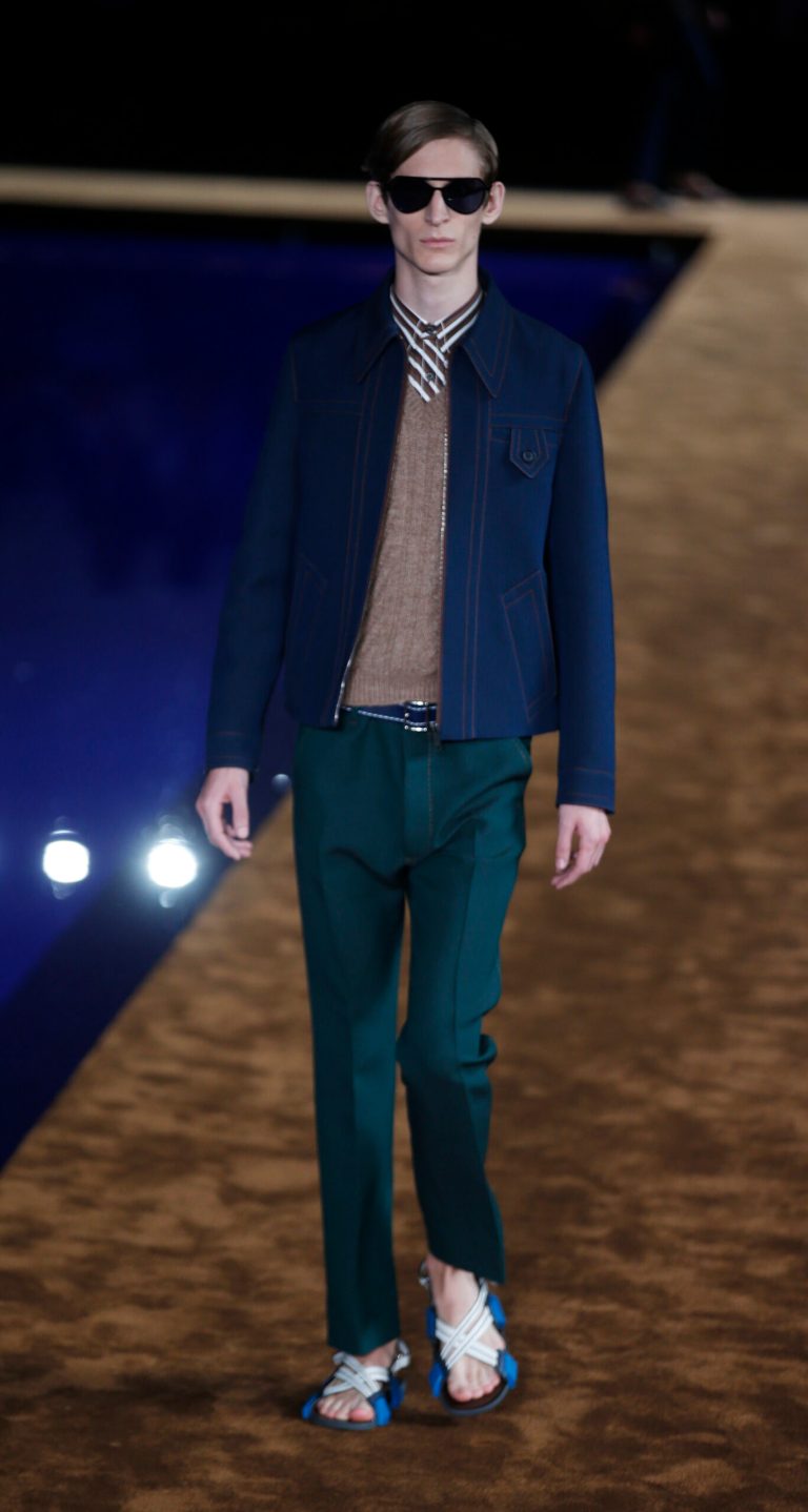 A model wears a creation for Prada men's Spring-Summer 2015 collection, part of the Milan Fashion Week, unveiled in Milan, Italy, Sunday, June 22, 2014. (AP Photo/Luca Bruno)