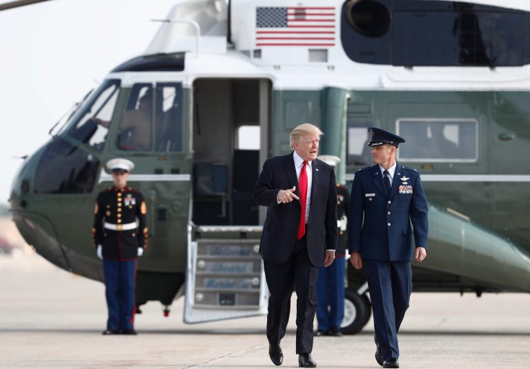 President Donald Trump walks from Marine One to board Air Force One, Saturday, July 22, 2017, in Andrews Air Force Base, Md., en route to Naval Air Station Norfolk, in Norfolk, Va., to attend the commissioning ceremony of the aircraft carrier USS Gerald R. Ford (CVN 78). (AP Photo/Carolyn Kaster)