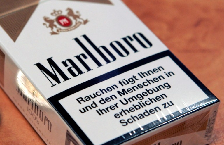 FILE - This Jan. 17, 2008 file photo shows a pack of Marlboro cigarettes in Bremen, Germany. Cigarette maker Philip Morris International Inc., which sells Marlboros and other U.S. brands abroad, on Thursday, Oct. 16, 2014 said its third-quarter profit dropped 8 percent as cigarette sales fell in the overseas markets that it serves and it was hurt by foreign exchange rates for the U.S. dollar. (AP Photo/Joerg Sarbach, File)