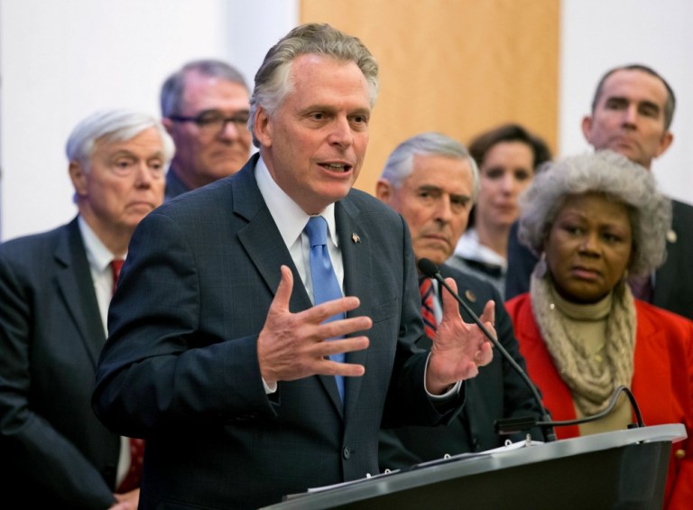 In April, Terry McAuliffe signed an order allowing roughly 206,000 felons who served their prison time and finished parole to register to vote. (AP Photo)