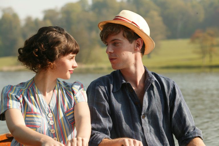   This film image released by IFC Films shows Felicity Jones as Dolly Thatchum, left, and with Luke Treadway as Joseph Pattern in a scene from 
