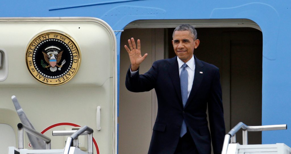 President Obama strains to straddle fundraising, foreign policy