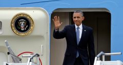 President Obama strains to straddle fundraising, foreign policy