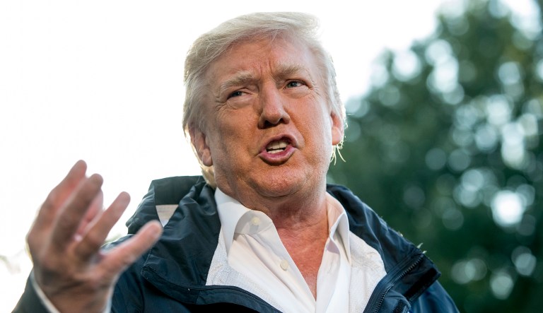 The president on Friday called on Congressional Democrats to join in him in working out a deal for Obamacare repeal. (AP Photo/Andrew Harnik)