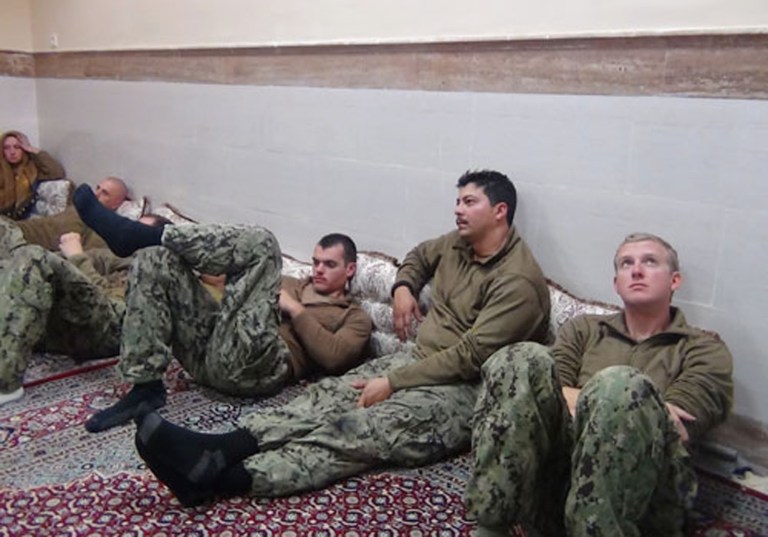 Two U.S. Navy riverine command boats accidentally entered Iranian waters in the Persian Gulf in January due to a mix of navigational errors and engine failure. The 10 sailors on board were detained overnight by members of the Iranian Revolutionary Guard. (Sepahnews via AP)