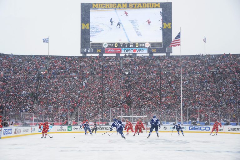 The Detroit Red Wings and the Toronto Maple Leafs play the first period during the 2014 Bridgestone NHL Winter Classic on January 1, 2014 at Michigan Stadium in Ann Arbor, Michigan. (Photo by Jamie Sabau/Getty images)