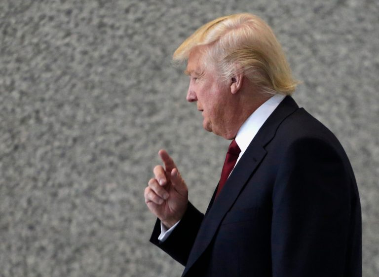FILE - In this May 14, 2013 file photo, Donald Trump arrives at federal court n Chicago to testify at a civil trial where he's accused of enticing investors to buy condos at his Chicago skyscraper with promises of profit-sharing, then quietly reneging on them. On Monday, May 20, 2013, Jacqueline Goldberg, 87, who alleges Trump cheated her in a bait-and-switch scheme has told jurors she had qualms about suing the developer-turned-TV star given his power and influence. (AP Photo/M. Spencer Green, File)