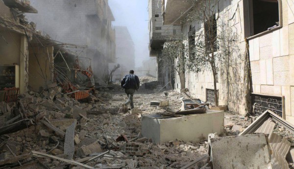 UN Security Council votes for Syria ceasefire as Damascus suburb burns