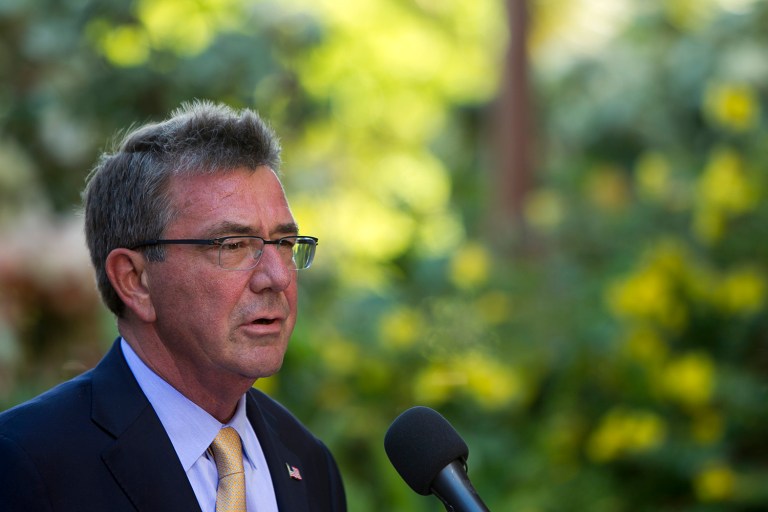 As much as Defense Secretary Ash Carter might want to wave his pen and forgive the debt in the interest of decency and common sense, he can't really. (AP Photo)