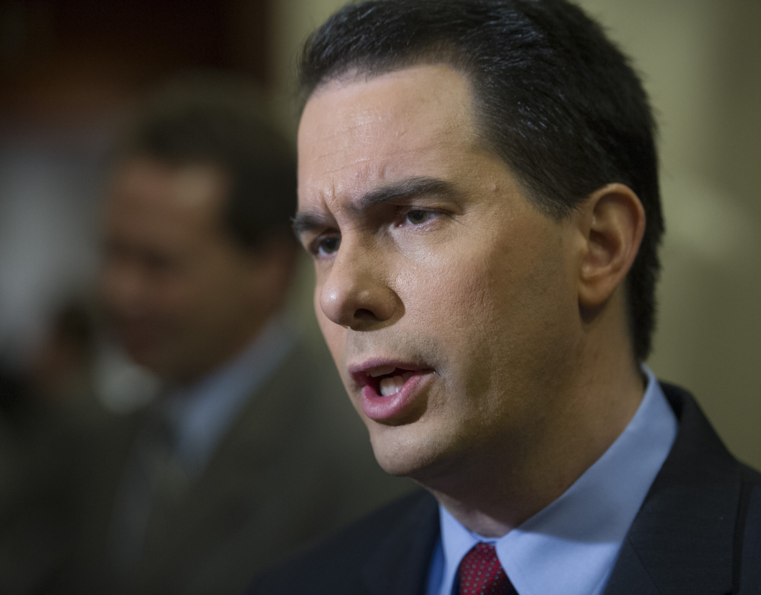 Wisconsin voter ID law illegal, lawyer tells top state court