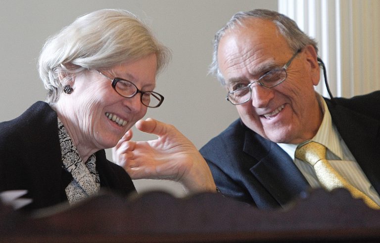 Sen. Jane Kitchel, left, and Sen. Dick Mazza  share a lighter moment on Friday, May 10, 2013 in Montpelier, Vt. The Legislature is aiming for a Saturday adjournment. (AP Photo/Toby Talbot)