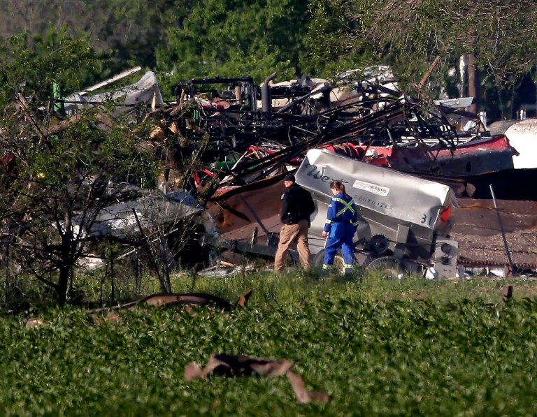 Emergency workers patrol the scene Saturday, April 20, 2013, three days after an explosion at a fertilizer plant in West, Texas. The massive explosion at the West Fertilizer Co. Wednesday night killed at least 14 people and injured more than 160. (AP Photo/Charlie Riedel)