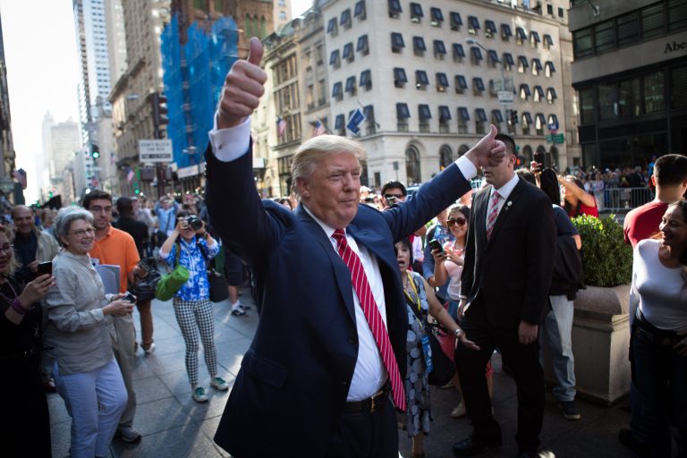 The ad references a $1 million fine that Trump had to pay for using illegal immigrants to build Trump Tower. (AP Photo/Kevin Hagen)