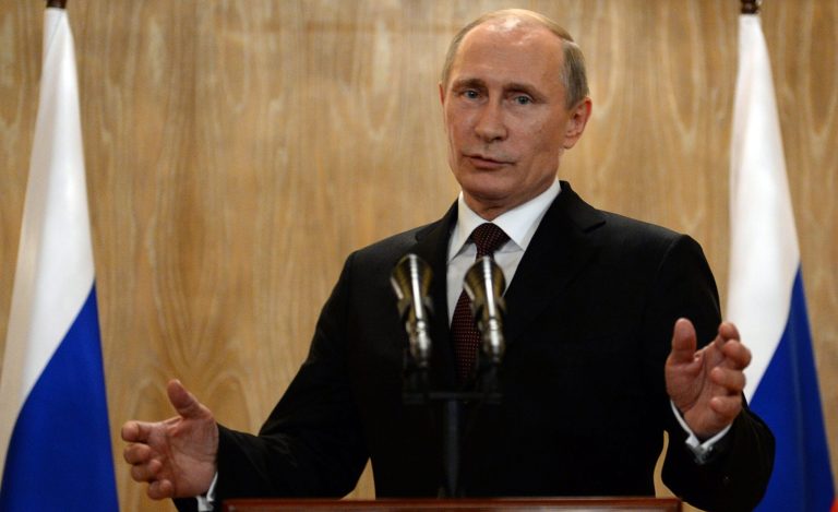 Russian President Vladimir Putin speaks at a news conference after the ASEM summit of European and Asian leaders in Milan, Italy, Friday, Oct.17, 2014.  Putin met with Ukrainian President Petro Poroshenko and key Western leaders in an attempt to negotiate a full end to hostilities in Ukraine that could ease sanctions against Russia. (AP Photo/Vasily Maximov, Pool)