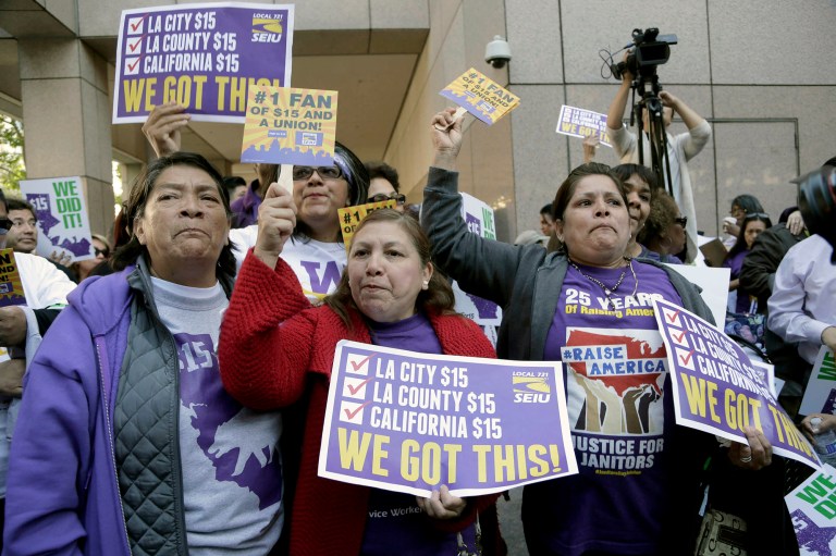 California's Gov. Jerry Brown signed a bill creating highest statewide minimum wage at $15 an hour by 2022. (AP Photo/Nick Ut)