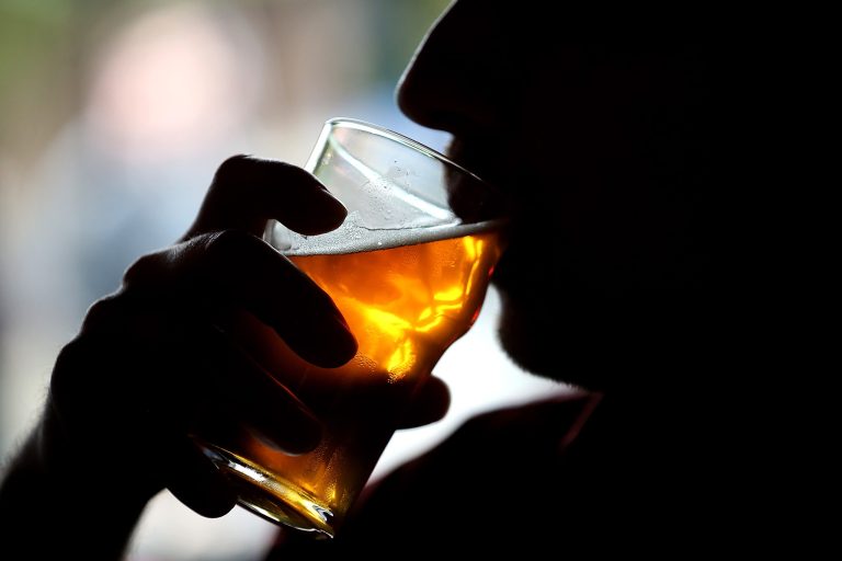 A Russian River Brewing Company customer takes a sip of the newly released Pliny the Younger triple IPA beer on February 7, 2014 in Santa Rosa, California. (Photo by Justin Sullivan/Getty Images)
