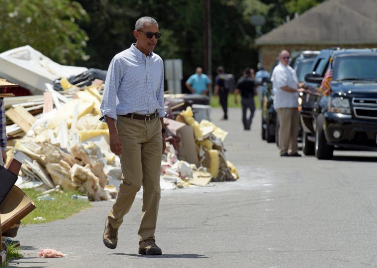 President Barack Obama tours Castle Place, a flood-damaged area of Baton Rouge, La., Tuesday, Aug. 23, 2016. Obama is making his first visit to flood-ravaged southern Louisiana as he attempts to assure the many thousands who have suffered damage to their homes, schools and businesses that his administration has made their recovery a priority. (AP Photo/Susan Walsh)