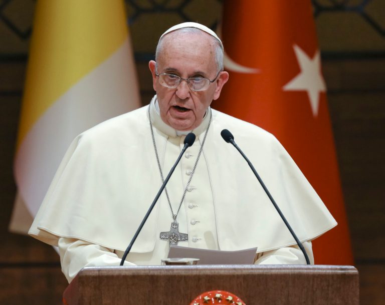 Pope Francis delivers his speech during his meeting with Turkish President Recep Tayyip Erdogan at the Presidential palace in Ankara, Friday, Nov. 28, 2014. Pope Francis condemned the Islamic State assault on Christians and other religions minorities in Iraq and Syria as he arrived Friday in neighboring Turkey to encourage Muslim leaders to take a stronger stand against extremists who twist religion to justify terrorism. (AP Photo/Burhan Ozbilici)