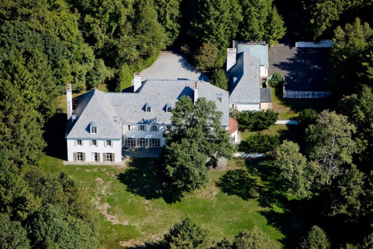   FILE - This photo provided in 2010 by Barbara Cleary's Realty Guild shows the estate of Huguette Clark in New Caanan, Conn., which had not been lived in for more than two decades since its owner became ill and ended up a recluse in a New York hospital room before dying at the age of 104. The late copper heiress' huge gifts to her staff are now in the spotlight in a New York City court fight, and an official handling the estate wants $37 million returned. (AP Photo/File)  