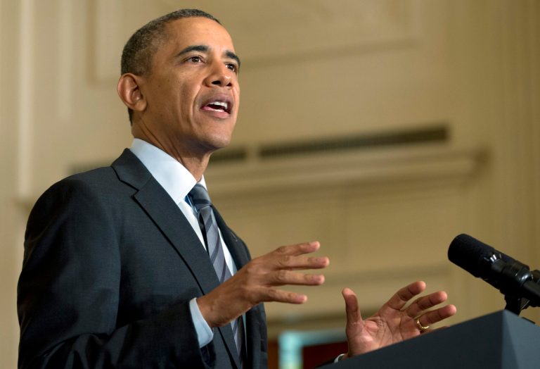 President Barack Obama gestures as he speaks in the East Room of the White House, Friday, Jan. 31, 2014, in Washington, about helping the long-term unemployed. (AP Photo/Carolyn Kaster)