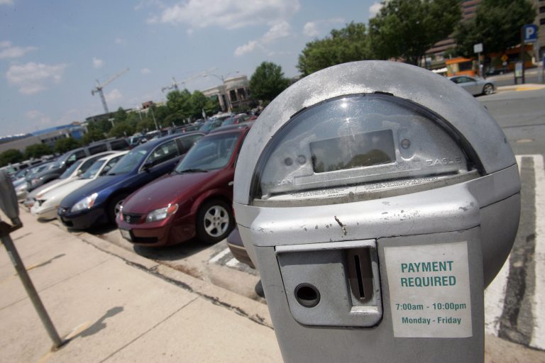 Parking meters line the rows of the Montgomery County Public Parking lot at 8009 Woodmont Avenue in Bethesda on Monday, June 11, 2007.  (Greg Whitesell/Examiner)