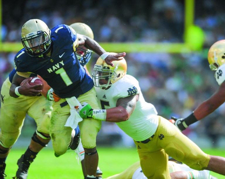 Barry Cronin/Getty Images
Navy quarterback Trey Miller threw one touchdown and one interception against the Notre Dame Fighting Irish.
