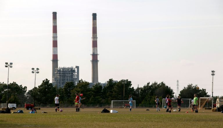 The settlement ends a 15-year lawsuit with Duke Energy for violating the Clean Air Act. (AP file)