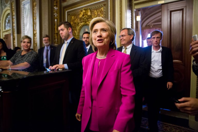 Democratic presidential candidate Hillary Rodham Clinton leaves a weekly policy luncheon with Senate Democrats on Capitol Hill in Washington, Tuesday, July 14. 2015.