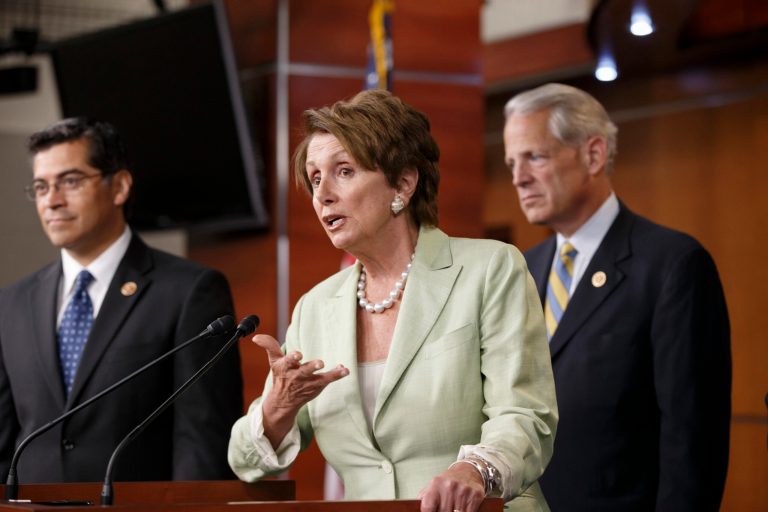   FILE - This July 31, 2013 file photo shows House Minority Leader Nancy Pelosi of Calif., center, accompanied by Rep. Xavier Becerra, D-Calif., left, and Rep. Steve Israel, D-N.Y. speaking during a news conference on Capitol Hill in Washington. The pressure off for now on Syria, Democrats are eager to return you to Washingtonâs regularly-scheduled gridlock. Pitched debates loom on budget and debt_never flattering endeavors that in the past have sunk the nationâs credit rating and Congressâ popularity. At least those debacles made both parties look bad, which to Democrats would be a welcome relief from President Barack Obamaâs effort to strike Syria for a chemical weapons attack. (AP Photo/J. Scott Applewhite, File)  
