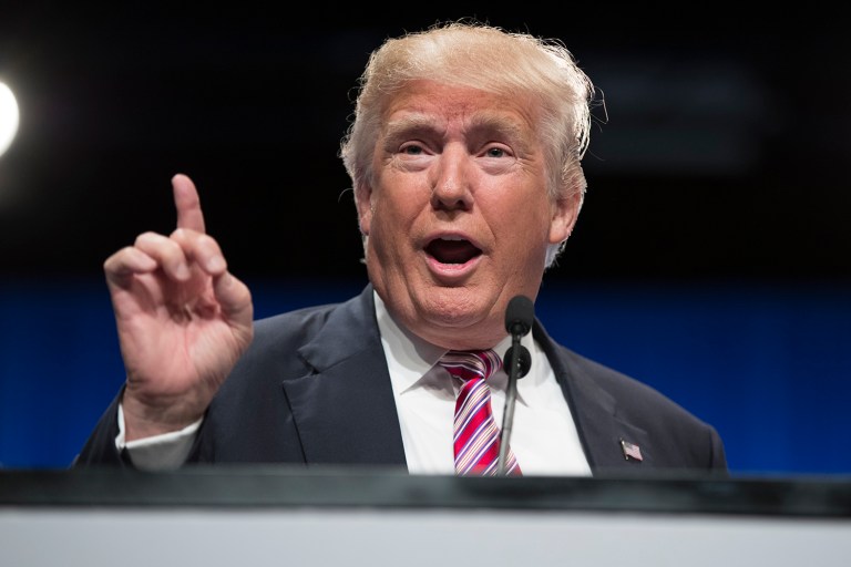 The Washington Post has said at least a dozen times this year that Republican nominee Donald Trump represents a direct threat to democracy, the U.S. and the world. (AP Photo/Evan Vucci)