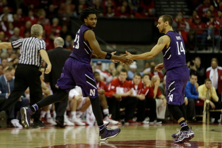 JerShon Cobb #23 of the Northwestern Wildcats celebrates after hitting a three-pointer during the second half of play against the Wisconsin Badgers at Kohl Center on January 29, 2014 in Madison, Wisconsin. (Photo by Mike McGinnis/Getty Images)