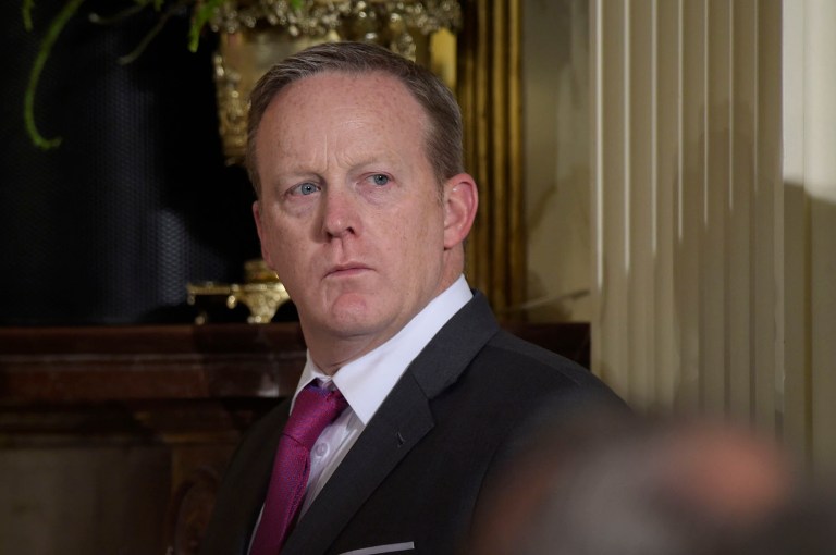 President Trump brought in family, an old friend and others, but not the devout Catholic staffer. (AP Photo/Susan Walsh)