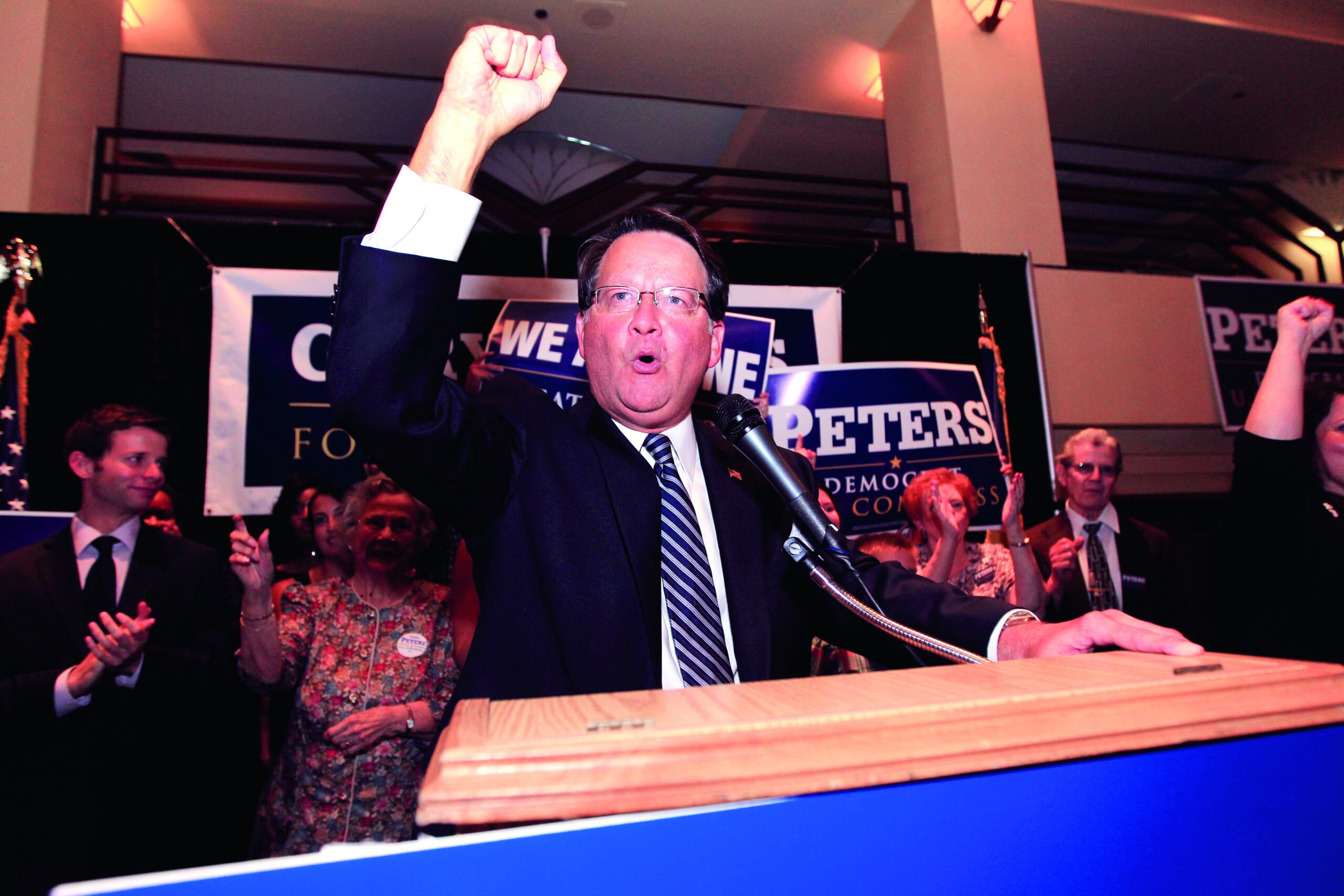The other candidate in Michigan’s Senate race lays low