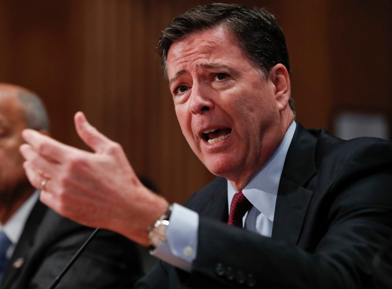 A bipartisan group of more than 30 former state attorneys general released a letter on Monday admonishing FBI Director James Comey for making a 