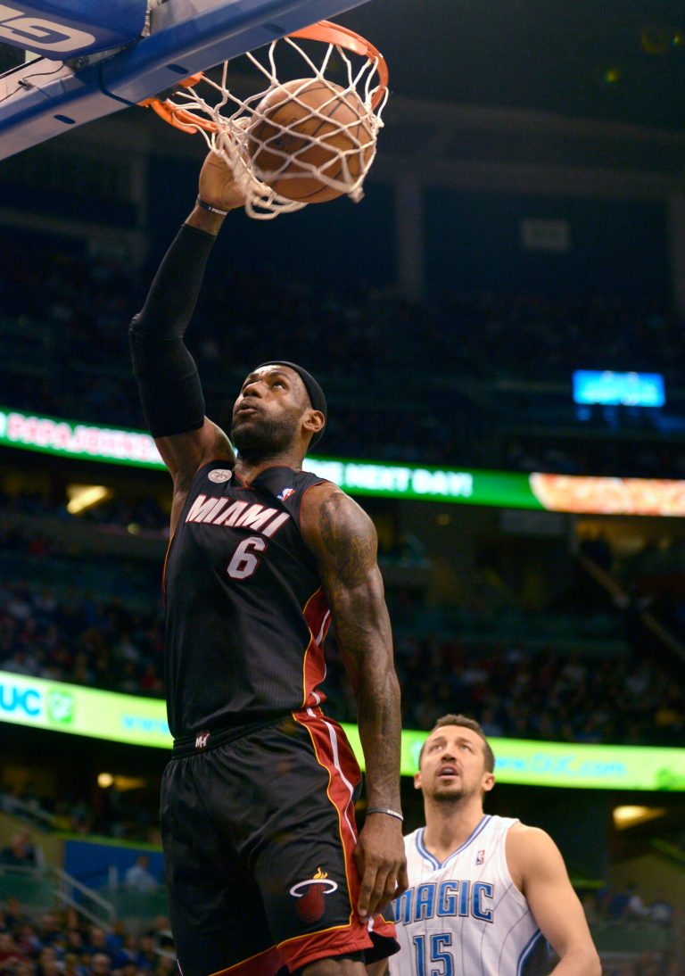   Miami Heat forward LeBron James (6) dunks the ball in front of Orlando Magic forward Hedo Turkoglu (15) during the first half of an NBA basketball game in Orlando, Fla., Monday, Dec. 31, 2012.(AP Photo/Phelan M. Ebenhack)  