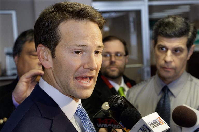 In this Feb. 6, 2015 file photo, Rep. Aaron Schock, R-Ill. speaks to reporters in Peoria Ill. (AP Photo/Seth Perlman, File)