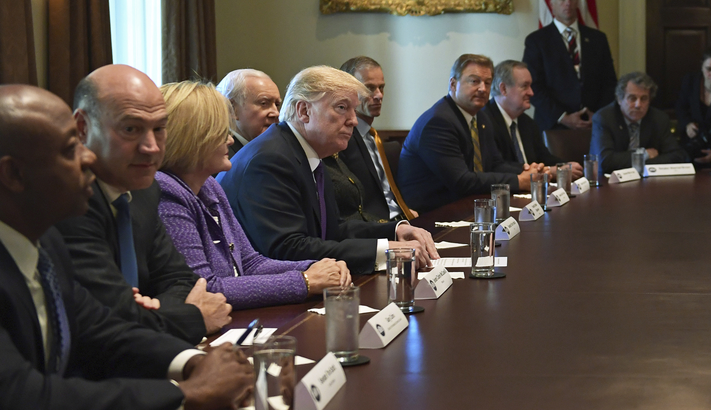 Trump promises Democrats he will shield middle class from tax hike