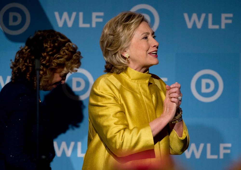 Clinton campaign takes reins of DNC, sidelines Wasserman Schultz