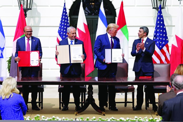 Foreign Affairs Minister of Bahrain Abdullatif bin Rashid Al Zayani, Prime Minister of Israel Benjamin Netanyahu, President Trump, and Foreign Affairs Minister of the United Arab Emirates Abdullah bin Zayed bin Sultan Al Nahyan participate in the signing ceremony of the Abraham Accords on the South Lawn of the White House on September 15. 