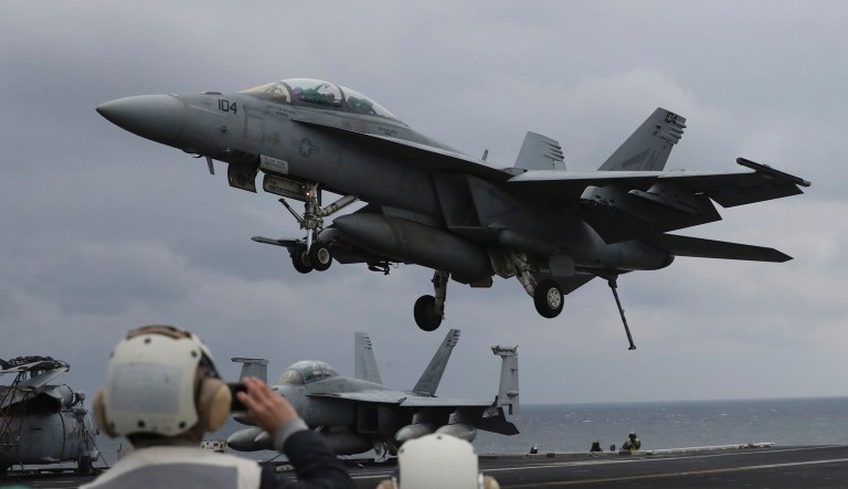 An F/A-18E Super Hornet preparing to land on the aircraft carrier USS Nimitz was forced to take evasive action Tuesday, when an Iranian drone came dangerously close to the U.S. warplane over the Arabian Gulf, according to the U.S. Navy. (AP Photo/Lee Jin-man, File)