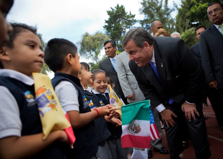 New Jersey Gov. Chris Christie talks with kindergarten and pre-K students lined up to greet him, as he visits a school in Puebla, Mexico, Friday, Sept. 5, 2014. The potential 2016 contender has called his three-day trade mission to Mexico a learning opportunity.(AP Photo/Rebecca Blackwell)