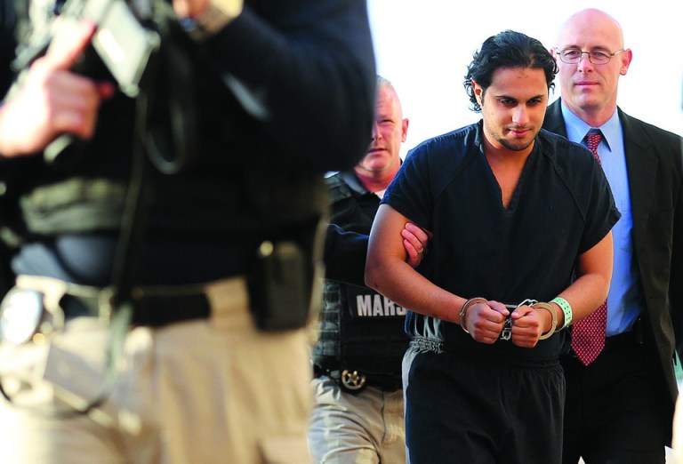 FILE - In this Feb. 25, 2011, file photo, Khalid Ali-M Aldawsari is escorted to court in Lubbock, Texas. A jury was selected Thursday, June 21, 2012, for the trial of the Saudi man who is accused of gathering bomb components with the intention of targeting sites across the United States, including the home of former President George W. Bush.(AP Photo/Lubbock Avalanche-Journal, Zach Long, File)