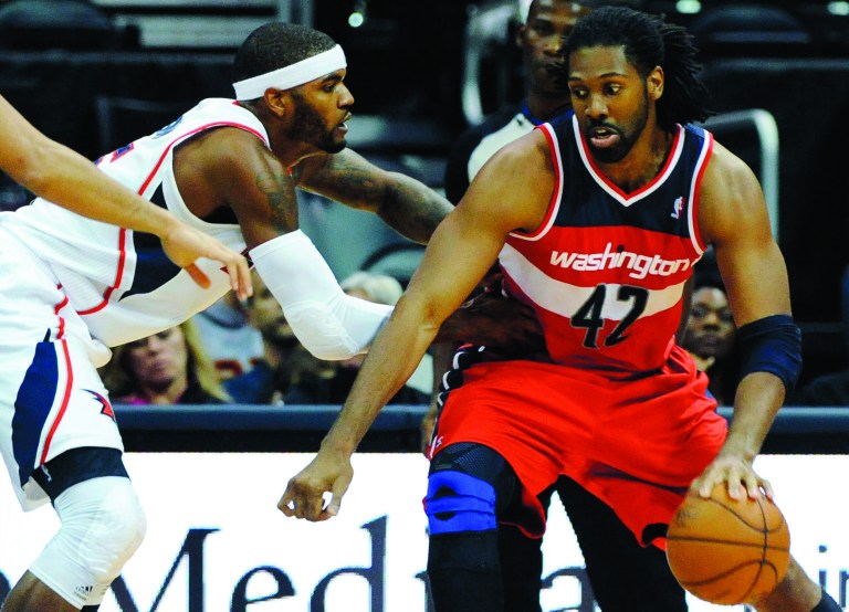 David Tulis/AP
A bout of plantar fasciitis has limited Nene to three games this season, and he is averaging 12.3 points and 4.0 rebounds.
