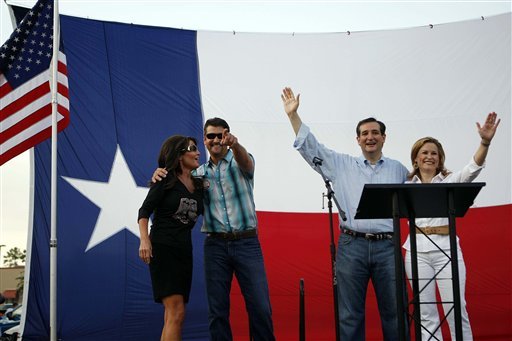 Former Governor of Alaska Sarah Palin stands with her husband Todd and Ted Cruz, Texas candidate for the U.S. Senate, and his wife Heidi in The Woodlands, Texas. (AP Photo)