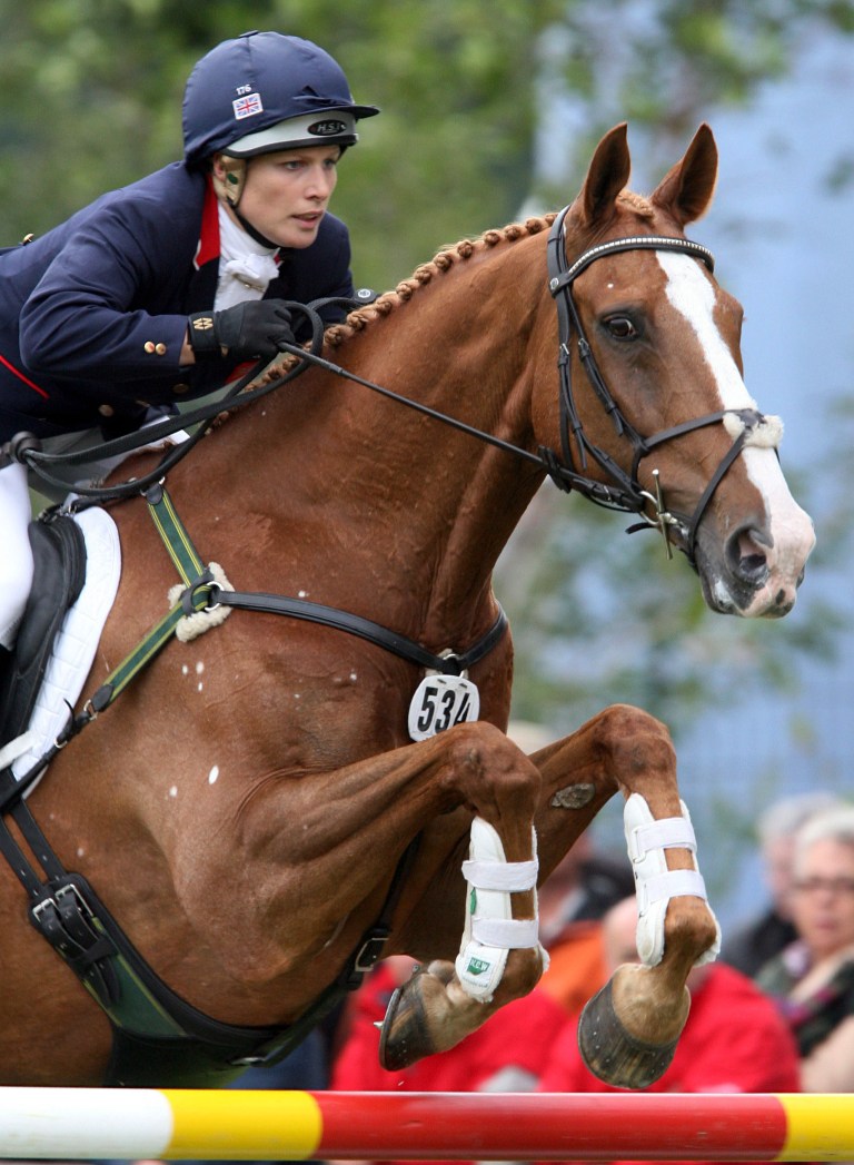   FILE - This Friday, July 6, 2007 file photo shows Britain's Zara Phillips, a granddaughter of Queen Elizabeth II, riding 'Toytown' in the jumping test competition of the Event Competitions at the World Equestrian Festival CHIO Aachen 2007 in Aachen, western Germany. Phillips has been announced Monday June 11 2012 as being selected for the UK Eventing Olympic team. The 2006 world champion will emulate her mother, the Princess Royal, who competed at the 1976 Montreal Games, while her father Captain Mark Phillips was a team gold medallist at Munich in 1972 and then won silver in Seoul 16 years later (AP Photo/Hermann J. Knippertz, File)  