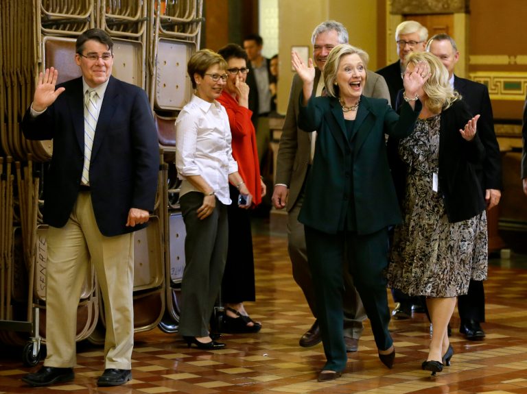 Even at her most polarizing moments, Clinton led a parallel life as the president's hostess. (AP Photo)