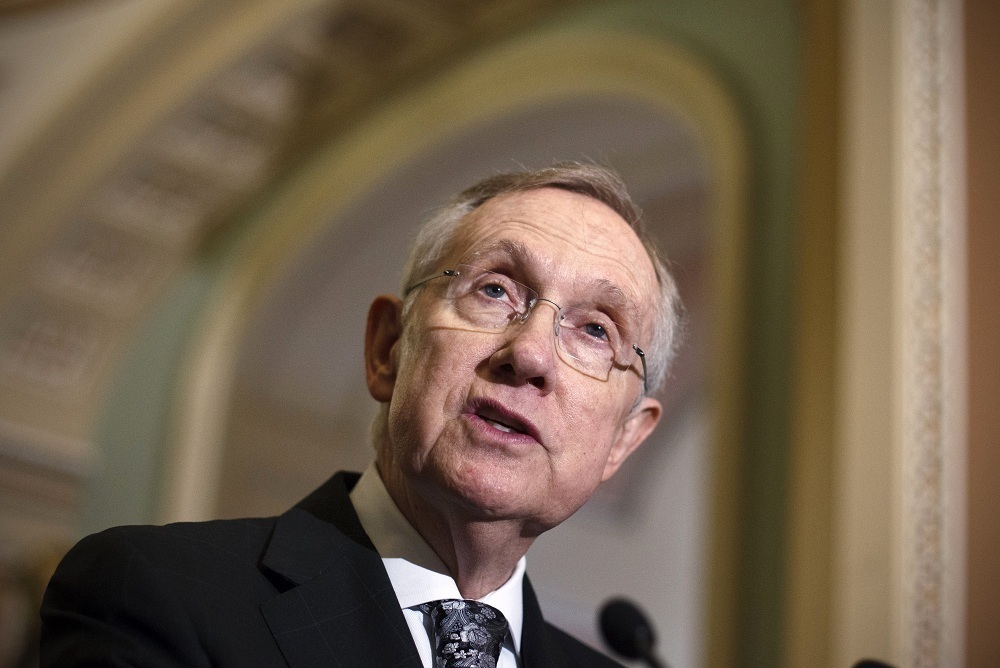 Reid delaying tax cut vote until after election