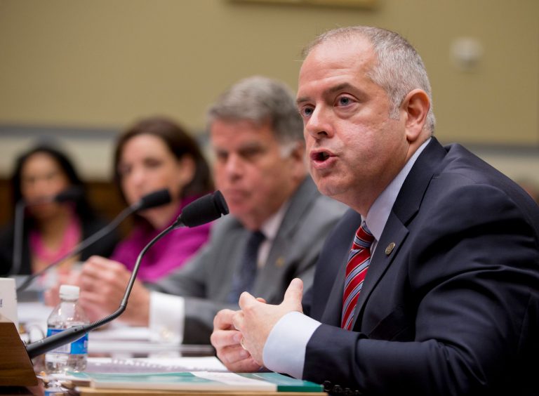 Paul Wester, right, accompanied by Archivist of the United States David Ferriero, center, and former Internal Revenue Service (IRS) counsel Jennifer O'Connor, testifies on Capitol Hill in Washington, Tuesday, June 24, 2014, before the House Oversight and Government Committee hearing. (AP Photo/Manuel Balce Ceneta)