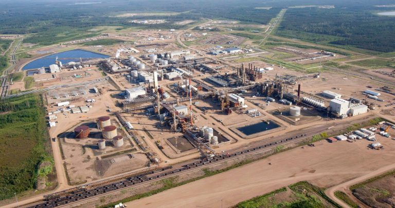   This Tuesday, July 10, 2012 aerial photo shows a Nexen oil sands facility near Fort McMurray, Alberta, Canada. On Friday, Dec. 7, 2012, Canada approved China's biggest overseas energy acquisition, a $15.1 billion takeover by state-owned CNOOC of Canadian oil and gas producer Nexen. (AP Photo/The Canadian Press, Jeff McIntosh)  